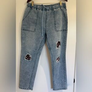 Light Wash Blue Women's Distressed Jeans with Leopard Patch Detail